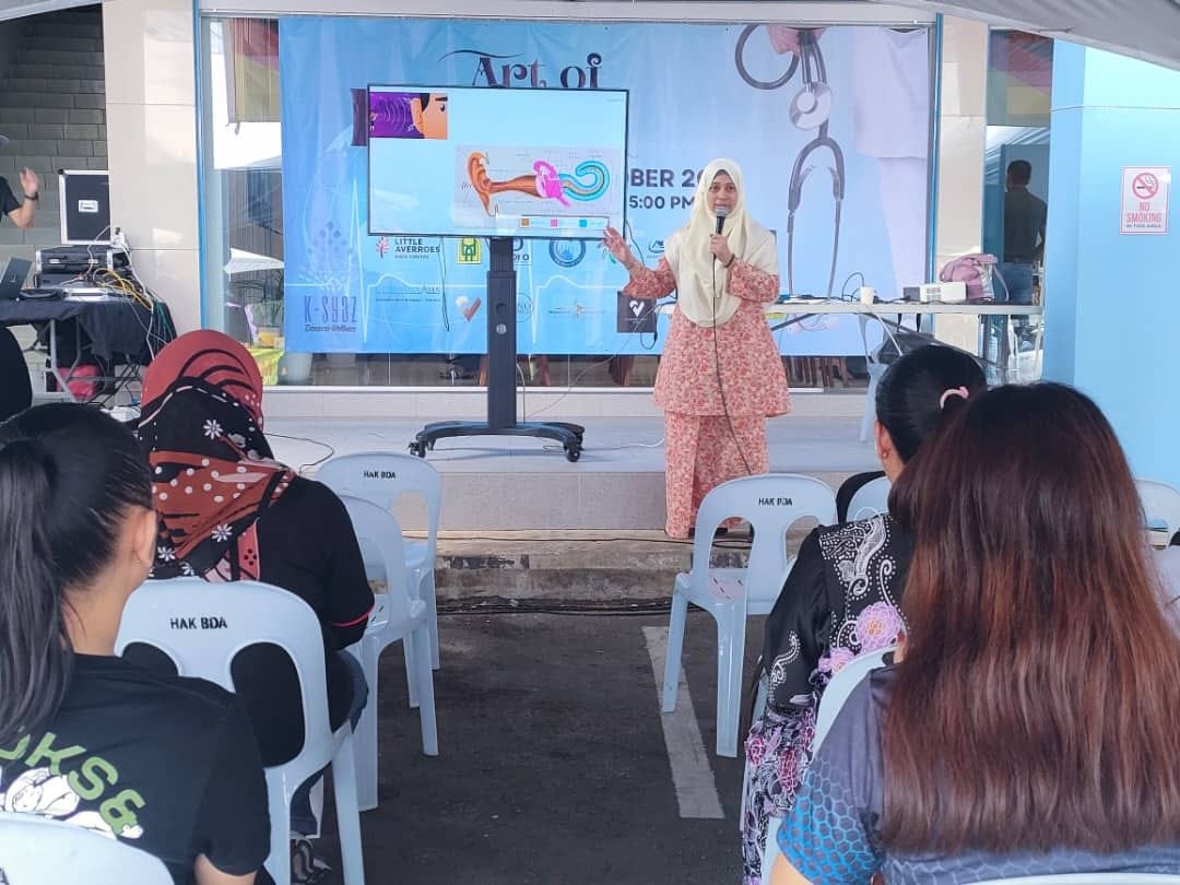 Dr. Yasmin presenting an ear-health talk to the community in Bintulu